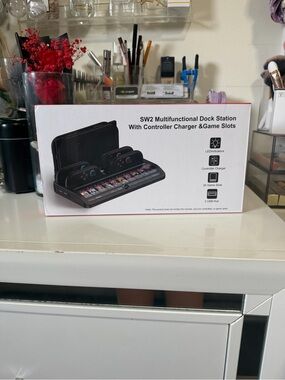 Nintendo Black Dock Station with Red Trim and Multicolor Game Labels